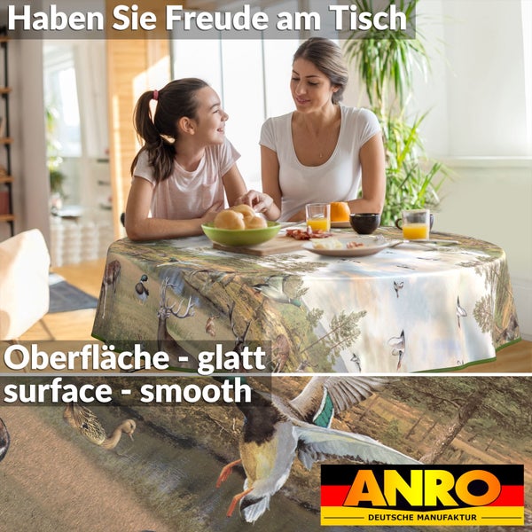 Runder Tisch mit glatter Oberfläche und Tischdecke mit Tiermotiven, ANRO Logo.
