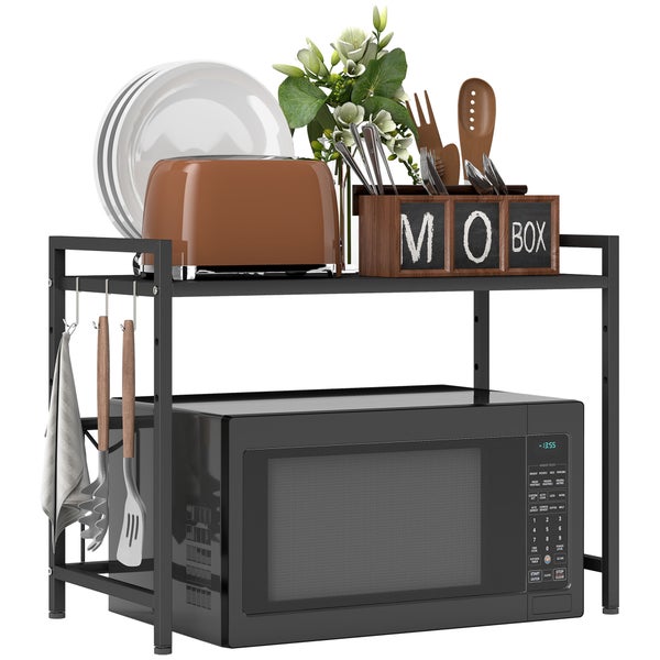 Zweistöckiges Mikrowellenregal aus schwarzem Metall mit Mikrowelle, Toaster, Tellern und seitlichen Haken für Küchenhelfer.