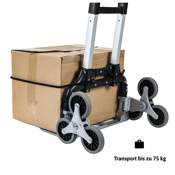 Treppensteiger Sackkarre aus Aluminium mit Sternrädern beladen mit einem Karton, Tragkraft bis zu 75 Kilogramm.