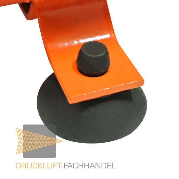 Schwarzer Vibrationsdämpfer Gummifuß an einer orangefarbenen Metallhalterung. Druckluft-Fachhandel Logo.