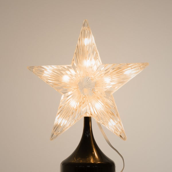 Beleuchteter Stern aus Kunststoff auf einem dunklen Sockel für weihnachtliche Dekoration