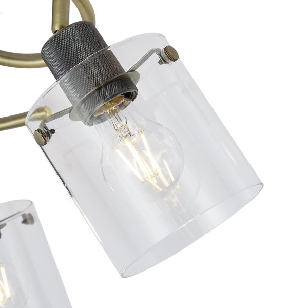 Nahaufnahme einer Lampe mit klarem Glasschirm und Glühbirne