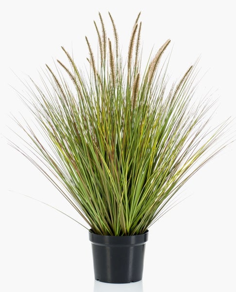 Detailansicht künstlicher Grashalme in Grün mit gelben und rötlich braunen Nuancen.