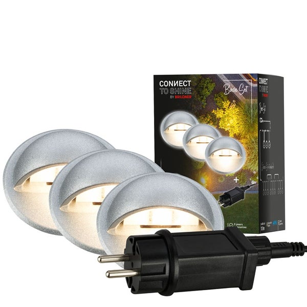 Briloner Connect to Shine LED Aussenleuchten Basis Set mit drei silberfarbenen runden Wandleuchten und Netzstecker.