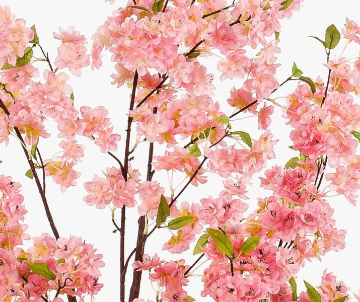 Künstlicher Kirschblütenzweig mit rosa Blüten und grünen Blättern.