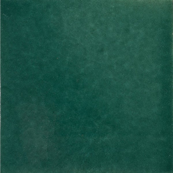 Einfarbige grüne Fliese
