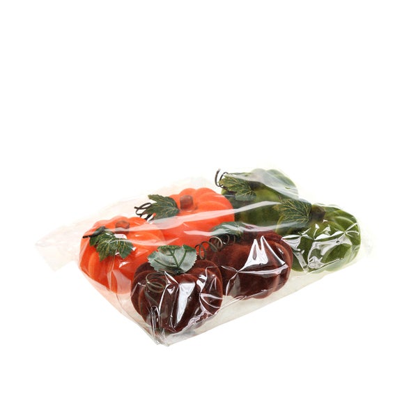 Dekorative Kürbisse in einer Verpackung für Herbstdekoration