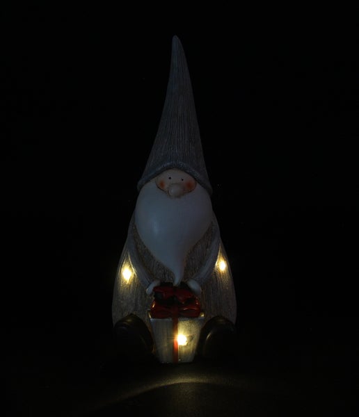 Dekorative Zwergenfigur mit Geschenk und Beleuchtung für den Innenbereich