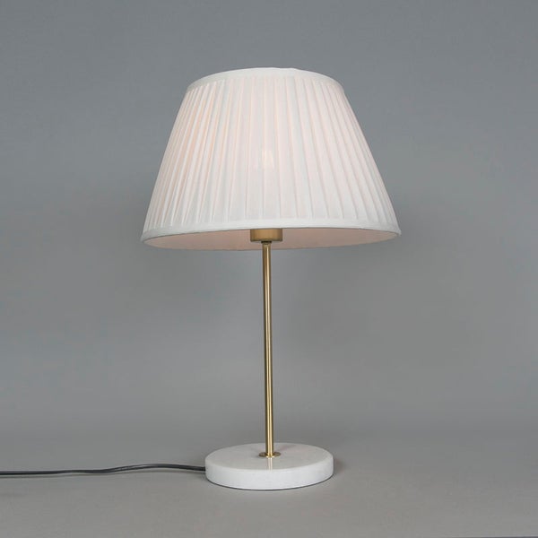 Tischleuchte mit plissiertem Lampenschirm und rundem Sockel