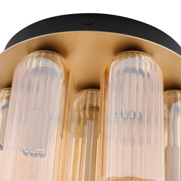 Deckenleuchte mit zylindrischen, geriffelten Glasschirmen auf einer kreisförmigen Grundplatte.