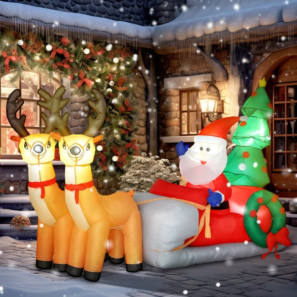 Große aufblasbare Weihnachtsdekoration mit Weihnachtsmann im Schlitten, zwei Rentieren, Tannenbaum und Kranz, beleuchtet für den Außenbereich.