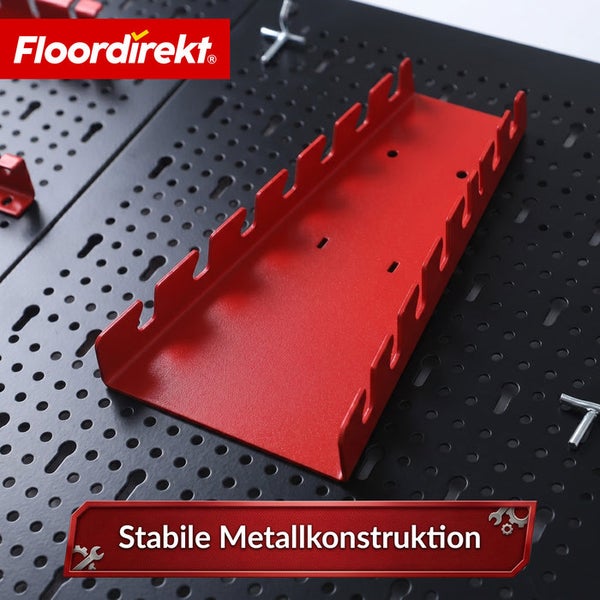 Floordirekt Logo. Roter Werkzeughalter aus stabiler Metallkonstruktion an einer Lochwand.