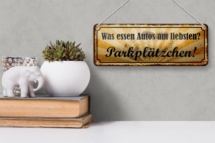 Blechschild Spruch 27x10cm was essen Autos Parkplätzchen Dekoration