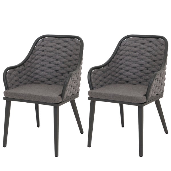 Zwei Armlehnstühle mit Sitzkissen und geflochtener Rückenlehne