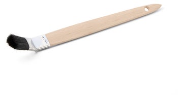 Heizkörperpinsel mit langem Holzstiel und abgewinkeltem Bürstenkopf für schwer zugängliche Stellen.