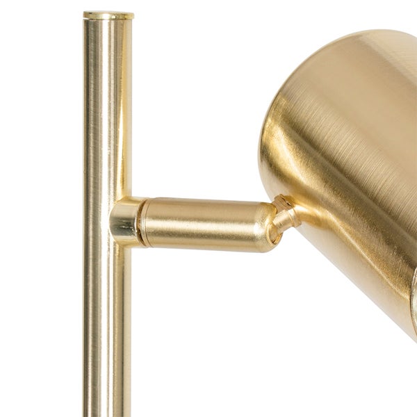 Detailaufnahme einer goldenen Stehlampe