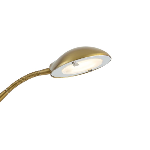 Messingfarbene Leselampe mit flexiblem Schwanenhals und ovalem LED Lampenkopf.