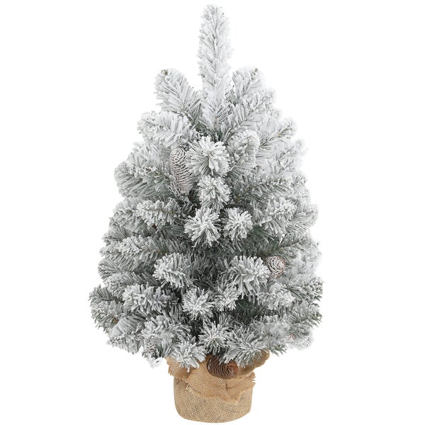 Künstlicher Mini-Weihnachtsbaum mit Schneeeffekt, Tannenzapfen und Jutesockel.