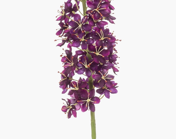 Künstliche Blume mit lila Blüten an einem grünen Stiel.