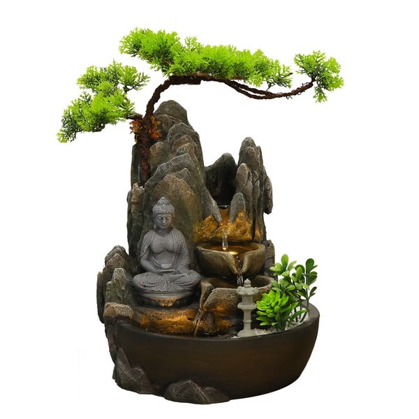 Zimmerbrunnen mit Buddha-Statue, künstlichem Bonsai-Baum, Felsformationen und integrierter Beleuchtung.