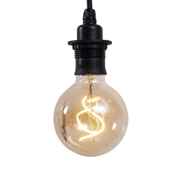 LED-Globelampe mit spiralförmigem Filament in schwarzer Fassung, warmweiß leuchtend.