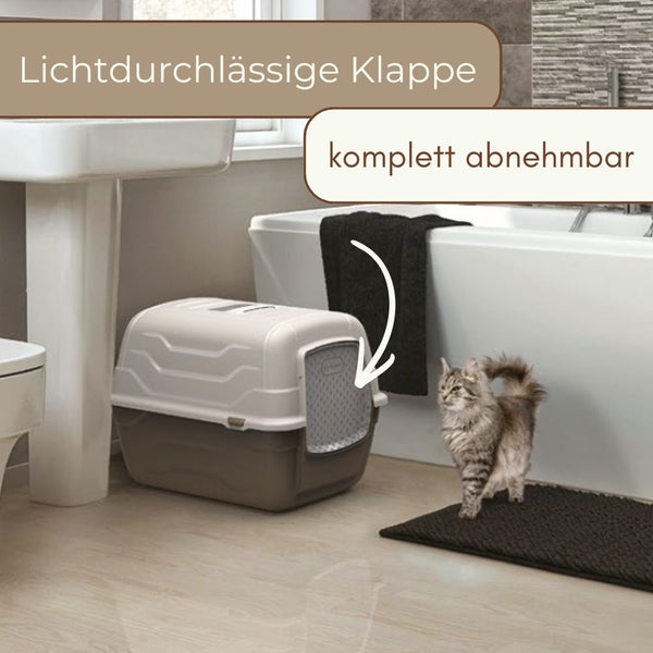 Geschlossene Katzentoilette mit lichtdurchlässiger Klappe und abnehmbarem Oberteil in einem hellen Badezimmer neben einer Katze.