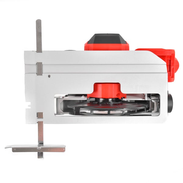 Unterseite einer roten Flachdübelfräse mit silberner Grundplatte, schwarzem Fräsblatt und einem verstellbaren Parallelanschlag aus Metall.
