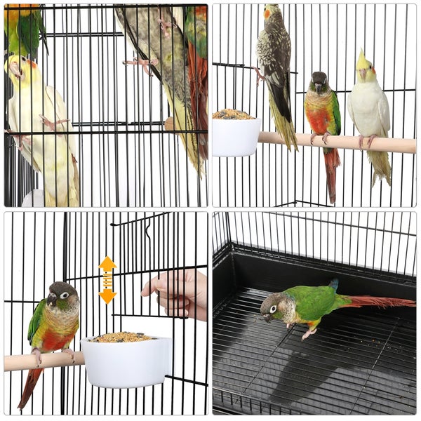 Vogelkäfig mit verschiedenen Vögeln und Futterbehältern.