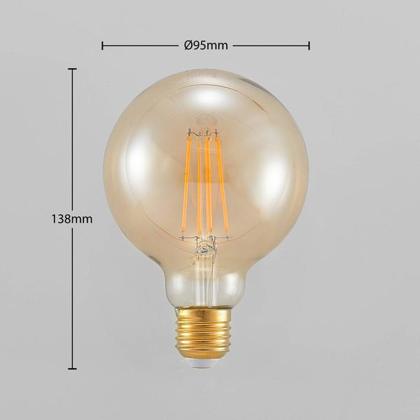 LED-Globelampe mit Filament, bernsteinfarbenes Glas, E27 Sockel, Durchmesser 95 Millimeter, Höhe 138 Millimeter.