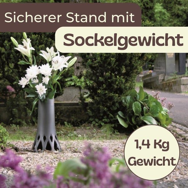 Blumenvase mit Sockelgewicht auf einem Grab
