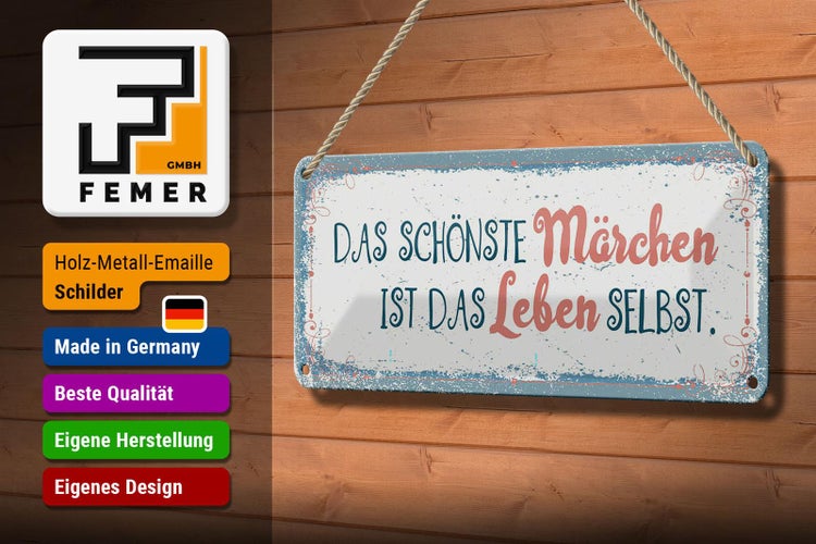 Emailschild mit dem Spruch 'Das schönste Märchen ist das Leben selbst' und Firmenlogo FEMER