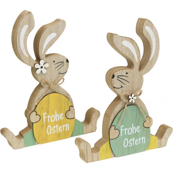Zwei Osterhasenfiguren aus Holz mit der Aufschrift 'Frohe Ostern'