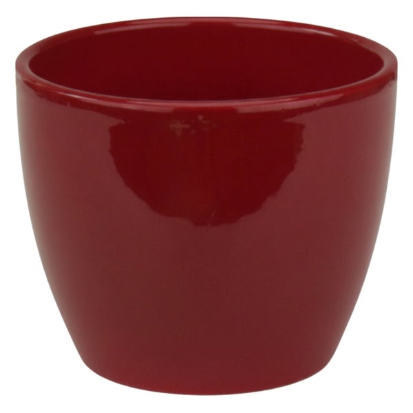 Roter Blumentopf aus glänzender Keramik in runder Form.