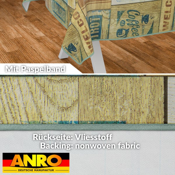 Tischdecke mit Café-Motiv und Paspelband sowie Rückseite aus Vliesstoff.