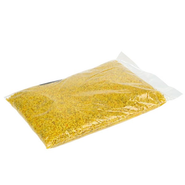 Gelber Dekokies in einem transparenten Beutel.