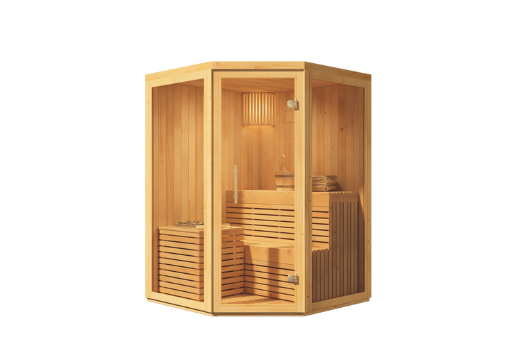 Ecksauna aus hellem Holz mit Glasfront, Holzbänken, Saunaofen, Steinen und Zubehör wie Eimer und Kelle im Innenraum.