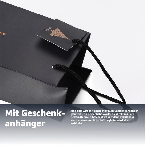 Schwarze Geschenktüte mit Geschenkanhänger