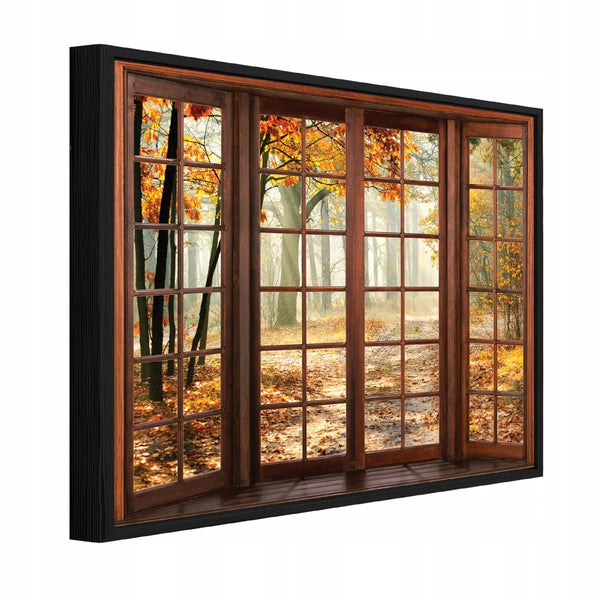 Wandbild mit Motiv eines Fensters mit Blick auf einen herbstlichen Wald im Holzrahmen