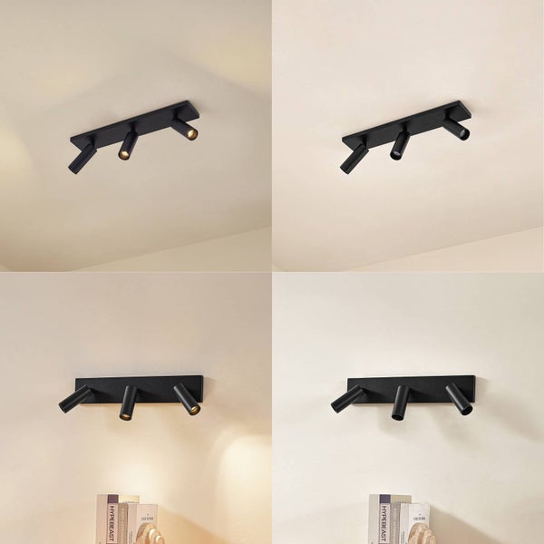 Schwarze Deckenleuchte mit drei Strahlern zur Innenraumbeleuchtung.