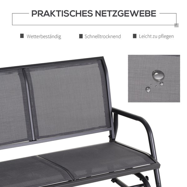 Dekorative Szene mit Orchideen, Sukkulenten und Kerze auf einem Tisch