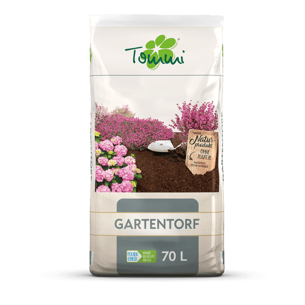 Ein Haufen dunkler Blumenerde mit feiner Struktur.