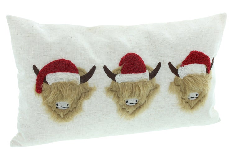 Kissen mit aufgenähten Hochlandrindern mit Weihnachtsmützen