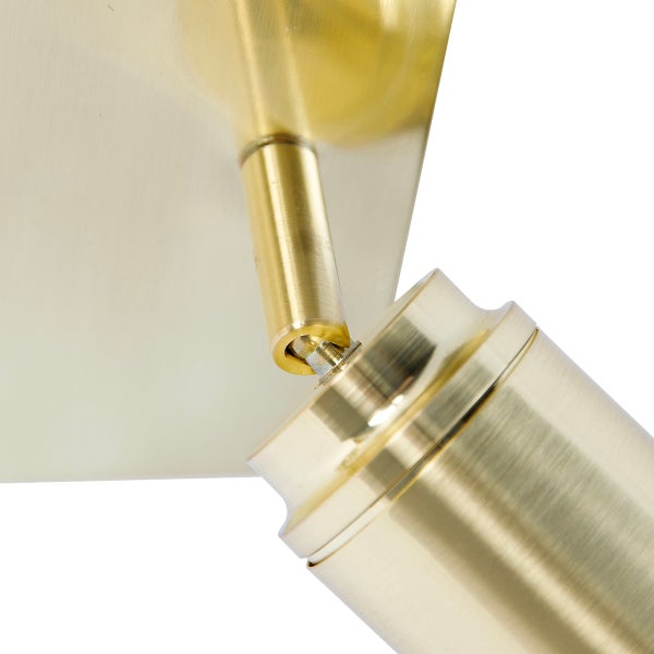 Detailansicht einer goldenen Strahlerlampe