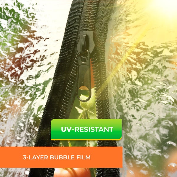 Detailaufnahme einer 3-lagigen Luftpolsterfolie mit Ultraviolett-Schutz und integriertem Reißverschluss vor Pflanzen.