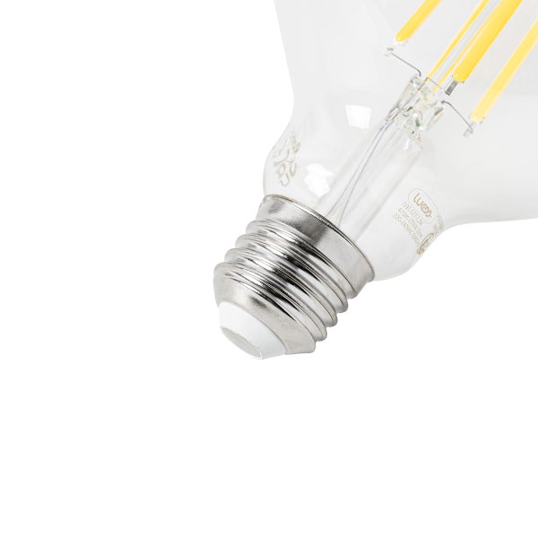 Detailansicht einer E27 LED Filament Glühbirne aus klarem Glas mit sichtbaren gelben Leuchtfäden.