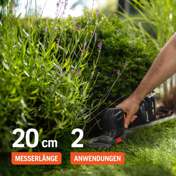 Akku Strauchschere im Einsatz zum Schneiden einer Hecke mit 20 Zentimeter Klingenlänge