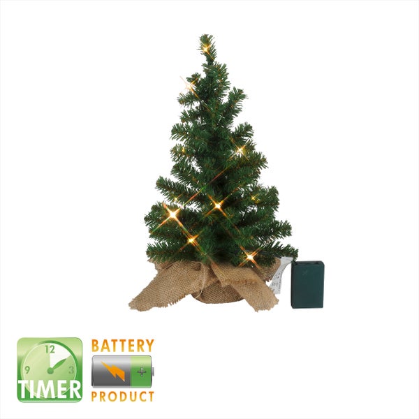 Dekorativer Miniatur Weihnachtsbaum mit Beleuchtung auf einem Jutesack