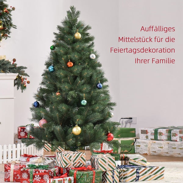 Künstlicher Weihnachtsbaum geschmückt mit bunten Kugeln, umgeben von vielen verpackten Geschenken in einem hellen Wohnzimmer.
