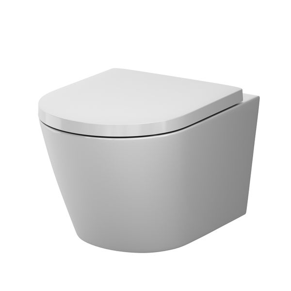 Wandhängende Toilette aus Keramik mit geschlossenem Toilettensitz, weiß, modernes Design.