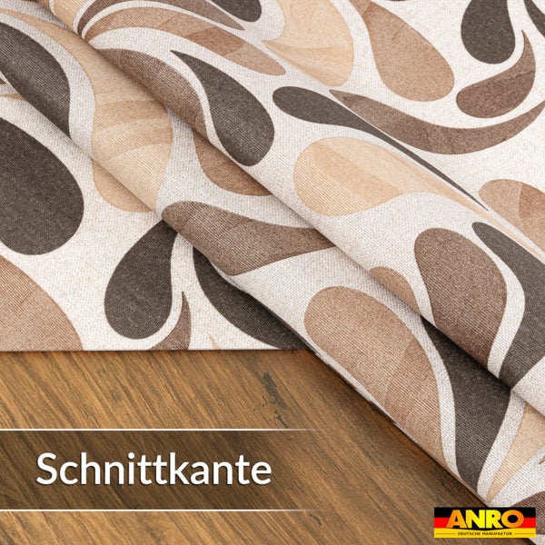 Tischdecke mit organischem Muster auf einer Holzoberfläche mit Schnittkante und ANRO Logo.